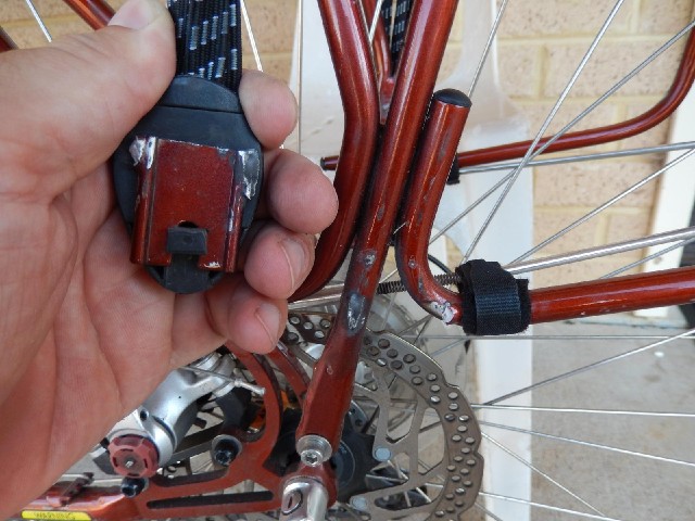 Now another bit has come off the bike. This is the elastic strap over the top of the panier rack, wh...