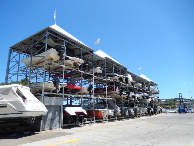 More shelves of boats. On the right is the forklift for getting them down.