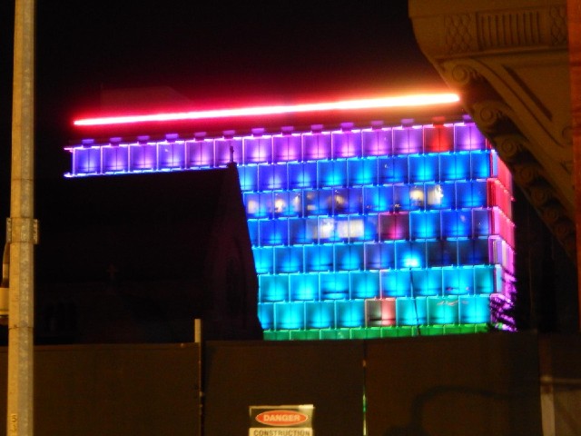 This is that council building again, now putting on a light show. At the moment, waves of colour are...