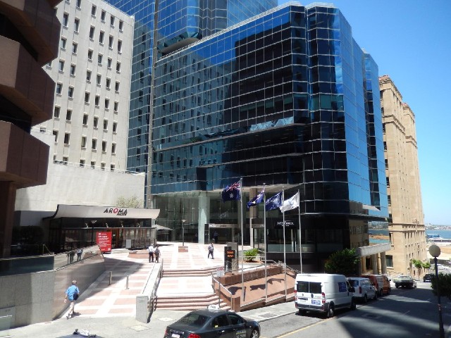 The base of the Exchange Plaza building. I see from the orange sign under the flags that the share i...