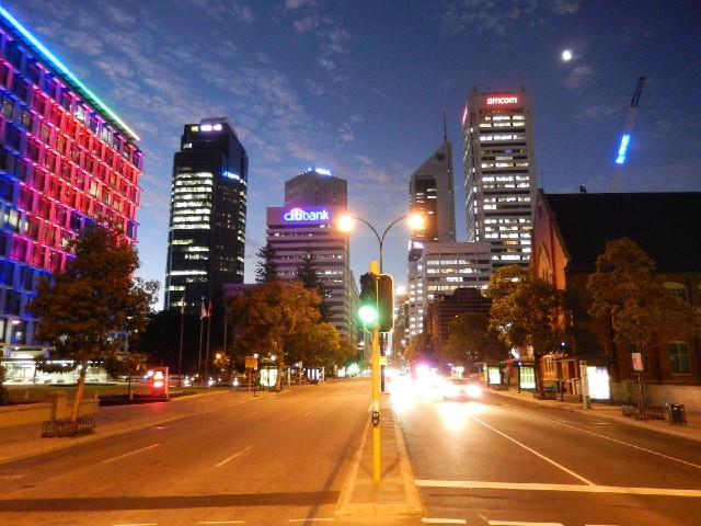 The words "CITY OF PERTH" are now scrolling across the building, although the exposure tim...