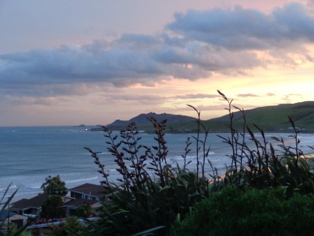 In this view from my motel, Nugget Point lighthouse is the bright dot above the horizon.