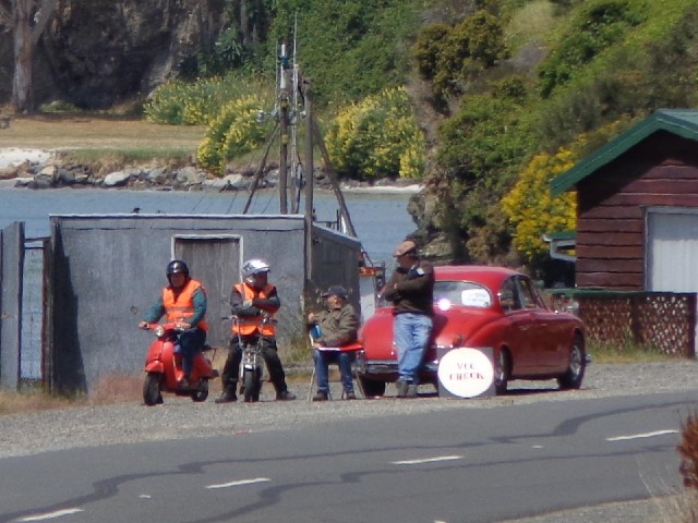 They are something to do with the moped event. The sign says "VCC CHECK".