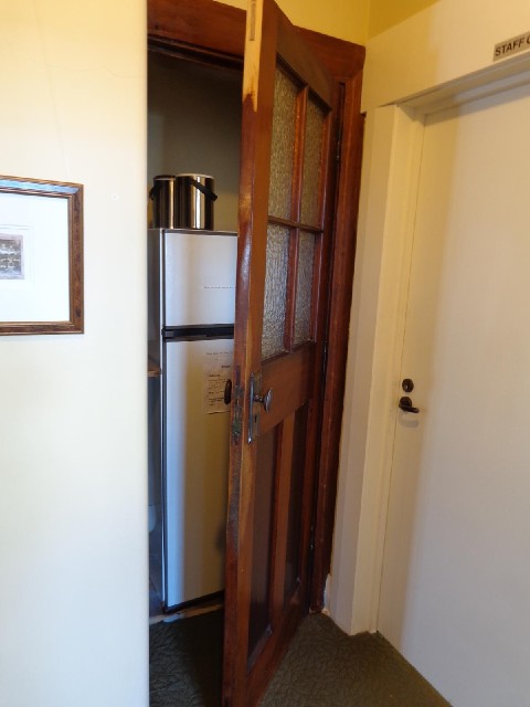 Being nosey, I opened this creaky door and found a fridge. I would later be told that this was origi...