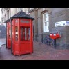 Phone boxes and post boxes.