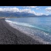 At the Moeraki boulders, the sandy beach was so flat that an incoming wave would continue to trundle...