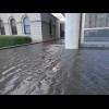 The wind is causing waves in this building's moat.