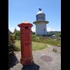 I don't know why there's a British-style postbox here but the lighthouse is one which was on the coa...
