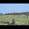 The paragliders are riding the air being deflected upwards when the sea breeze hits the cliffs. This...