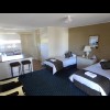 The room actually looks quite nice. It's got a good kitchen area. All the motels in New Zealand had ...