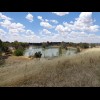 A lake in the loop of one of the freeway access ramps.