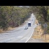 There are signs along the freeway instructing cyclists to use the left shoulder only. The trouble is...