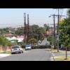 A suburban road cut in half by the railway.