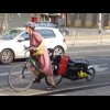 The serious touring luggage doesn't really seem to match the clothes.