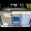 There is an inverter which powers this fridge but the other mains sockets in the van only work if th...