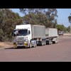 Somebody washing the windscreen of his road train.