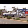 This is an unusual road train. It has two matching units and then a completely different type of tra...