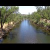 The river, sparkling in the sunlight.