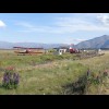 This place was offering biplane flights over Mount Cook. The flag said that you could fly now and th...