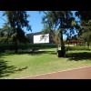 An outdoor cinema screen in the park.