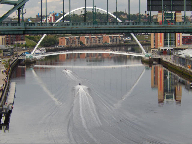 Two jet-skis coming to destroy the reflection.