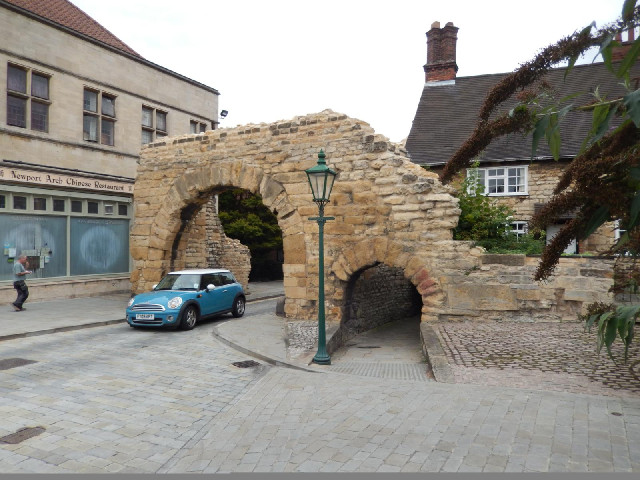 The footpath has had to be kept at the medieval ground level so that people can get through the arch...