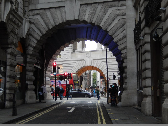 Archways through the terraces along both sides of Regent Street, which is where the bus is.