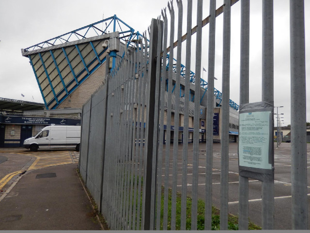The document taped to the fence is notice of Millwall's application to start selling alcohol here. S...