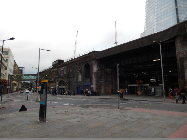 On the right, at the base of the Shard, is an entrance to London Bridge station.