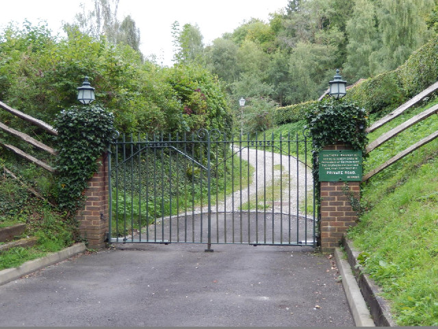 The sign on the gate says that this is a private road owned by the railway, as specified in the Sout...