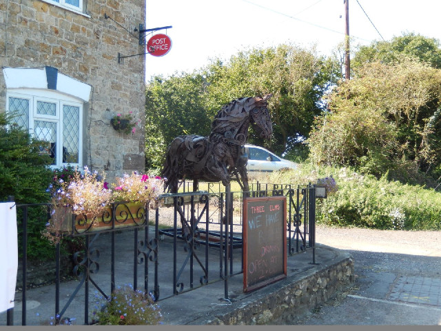 A sculpture at a pub next to a metalwork forge. There were a few others round the side.