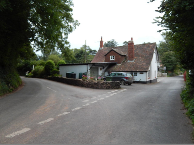 The house, called Island Cottage, is in the middle of a road junction, completely surrounded by the ...