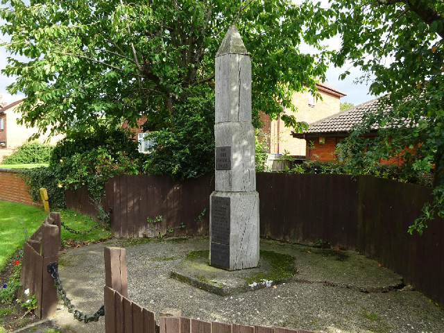 The village of Hartwell has a wooden war memorial.