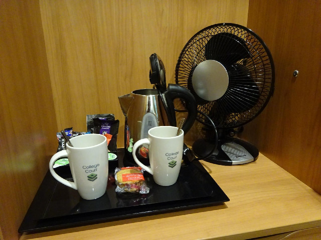 I opened the wardrobe to hang up my clothes and found all sorts of delights: coffee, biscuits, which...