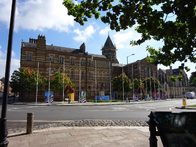 Rugby School. It resembles my own college because it was designed by the same architect.