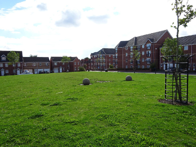 Part of the space is a mini football pitch, with stone balls for goalposts.