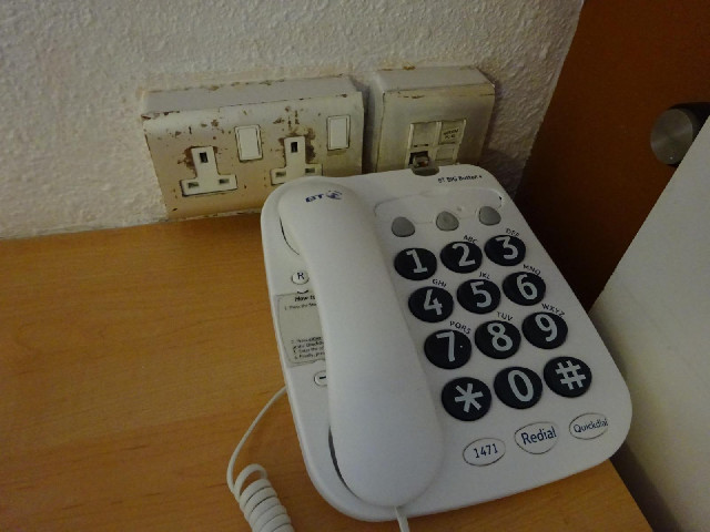 My room is very near the stairs, and it's got this big-buttoned phone... hang on a minute...