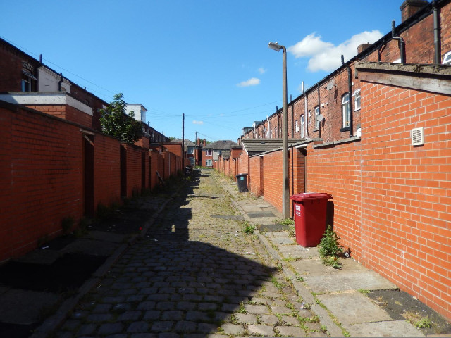 As is fairly common in this region, there are alleys like this between the backs of the houses.