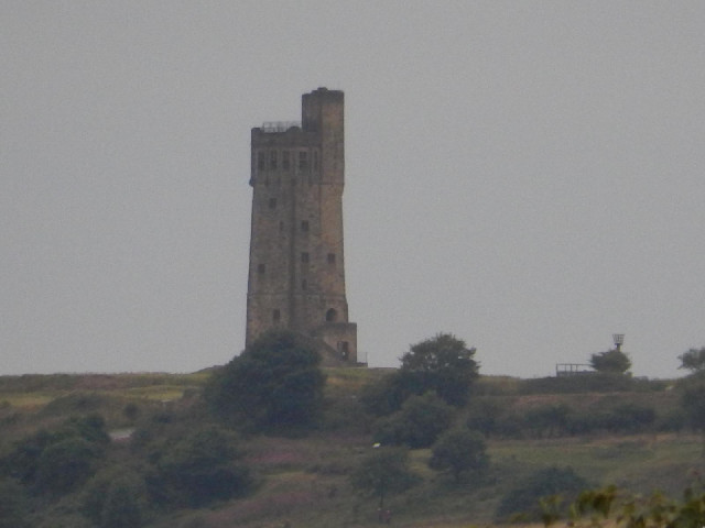 This older tower stands on a little mound like the Emley Moor tower, and is a similar colour. I wond...