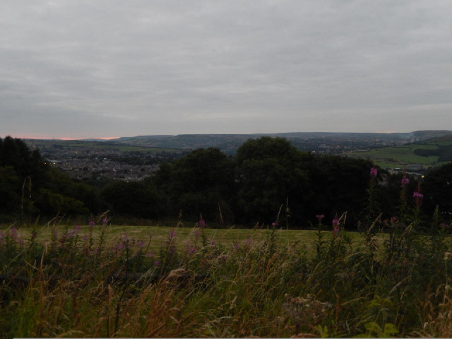 A bit of pink sunset on the left and smoke rising from Halifax on the right.