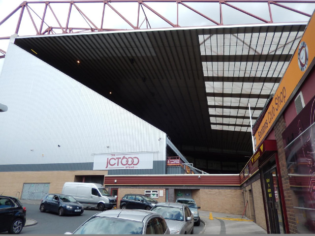 You get a good look at the inside of the cantilevered roof from outside the club shop.