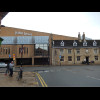 It looks like the buildings in Peterborough have grown over time while retaining their original colo...
