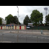 I've now moved on to the next ground: The Recreation Ground, home of Aldershot Town. The building on...