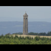 Some sort of monument on another hill.