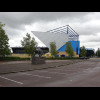 The Kassam Stadium with a sculpture of a bull.