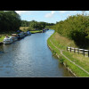 Back onto a canal again. The towpath would go through a variety of styles along the way but was neve...