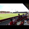 Aggborough, showing a good example of the two types of stand. The ones at the ends of the pitch are ...