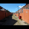 As is fairly common in this region, there are alleys like this between the backs of the houses.