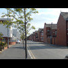 The houses on the two sides of this street clearly weren't built at the same time. The ones on the l...