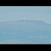 Two radomes on top of Clee Hill, about 20 km away. The large one is for air traffic control. The sma...
